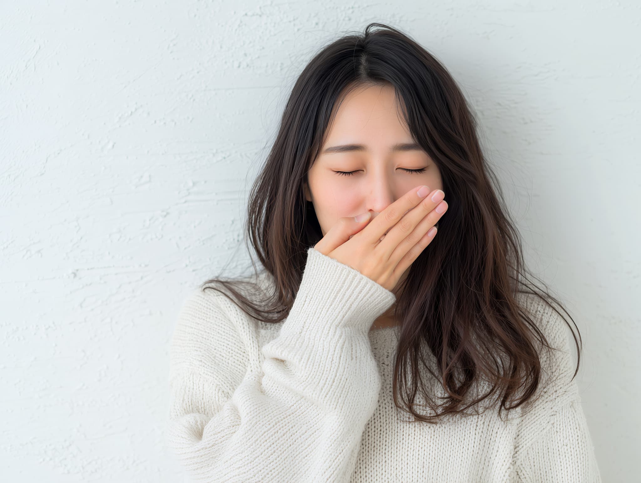 受け口の口元がコンプレックスの女性